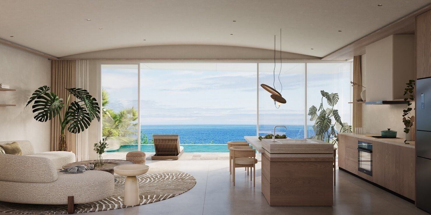 The Crest Residences — living area opening to the pool and sea